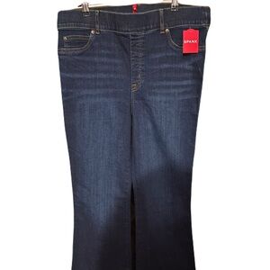 Spanx Women's body sculpting pull on Dark Blue Flare leg jeans.